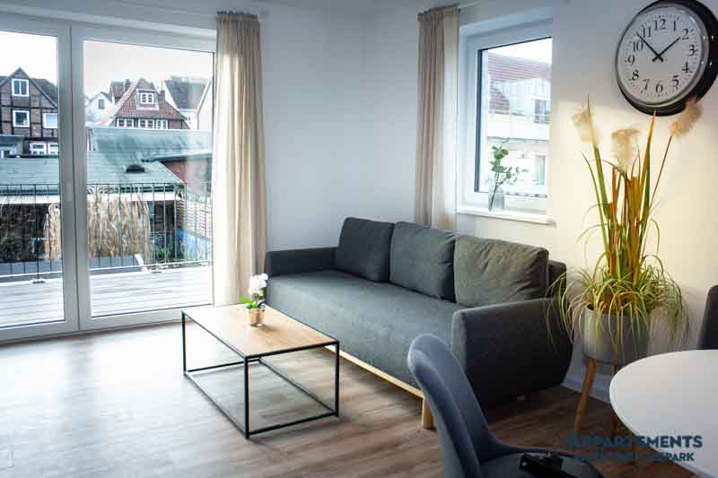 Ausstattung unseres Wohnzimmers mit gemütlicher Couch